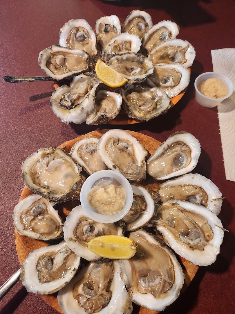 Seafood plates served in an unpretentious dining space.