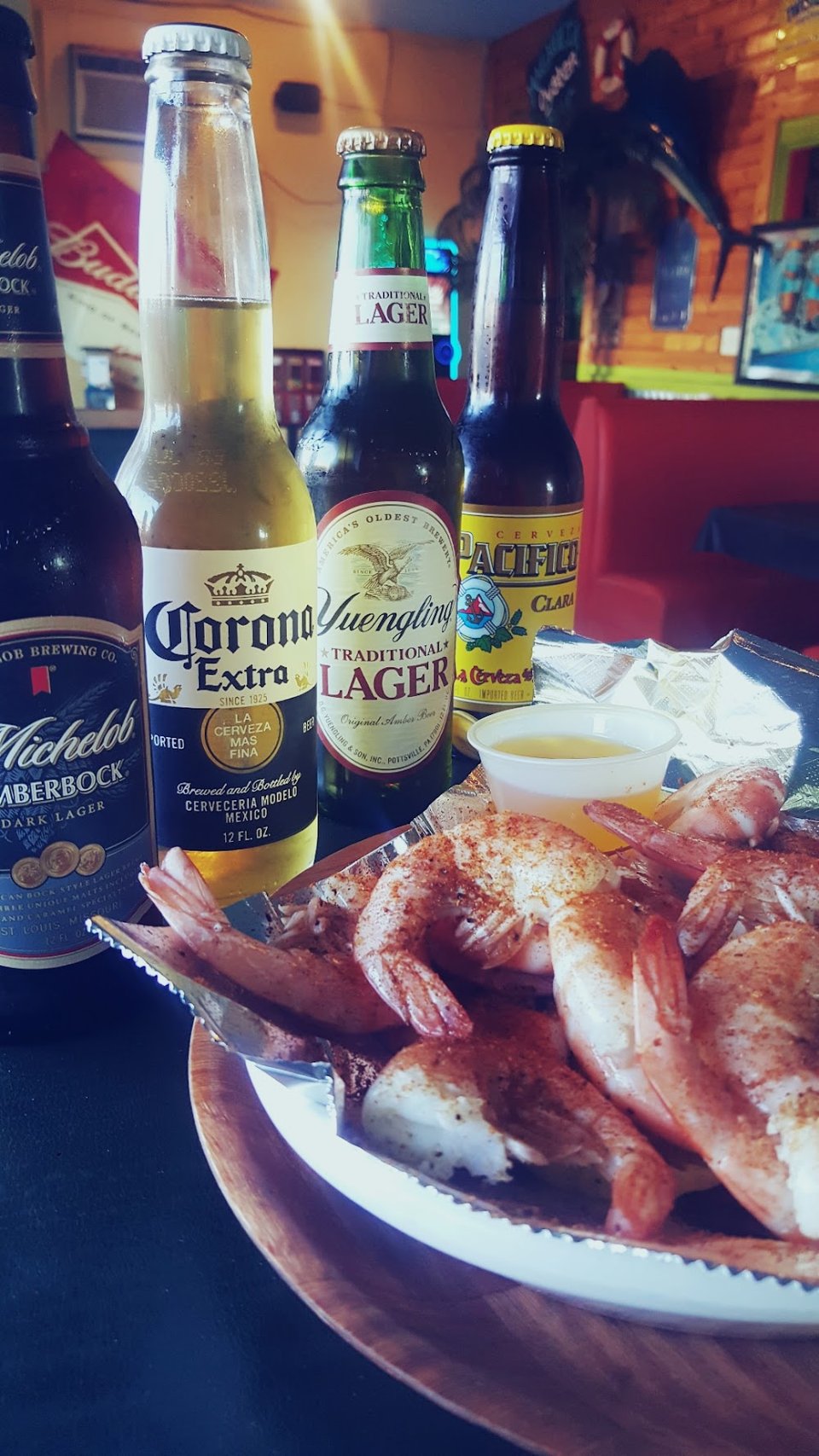 Seafood menu with raw and cooked oyster options.