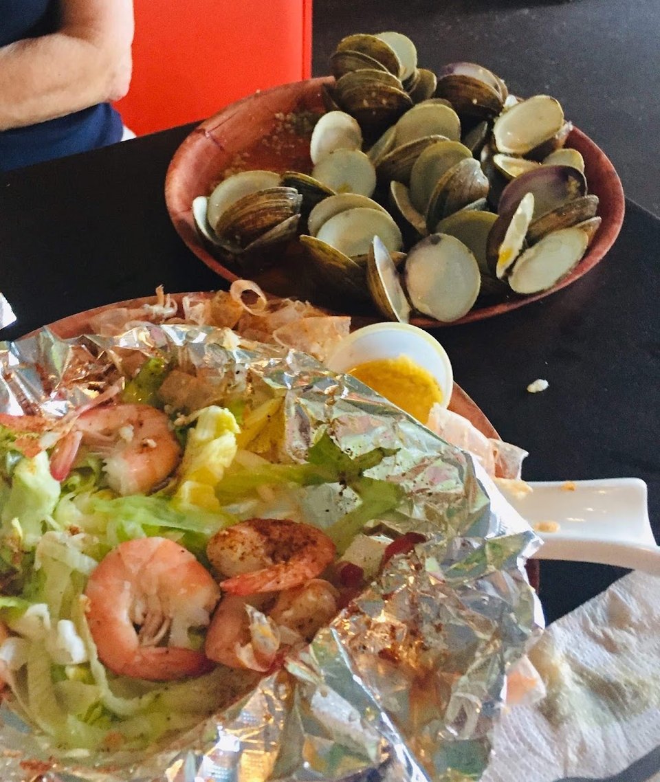 Restaurant menu with classic seafood and comfort food.